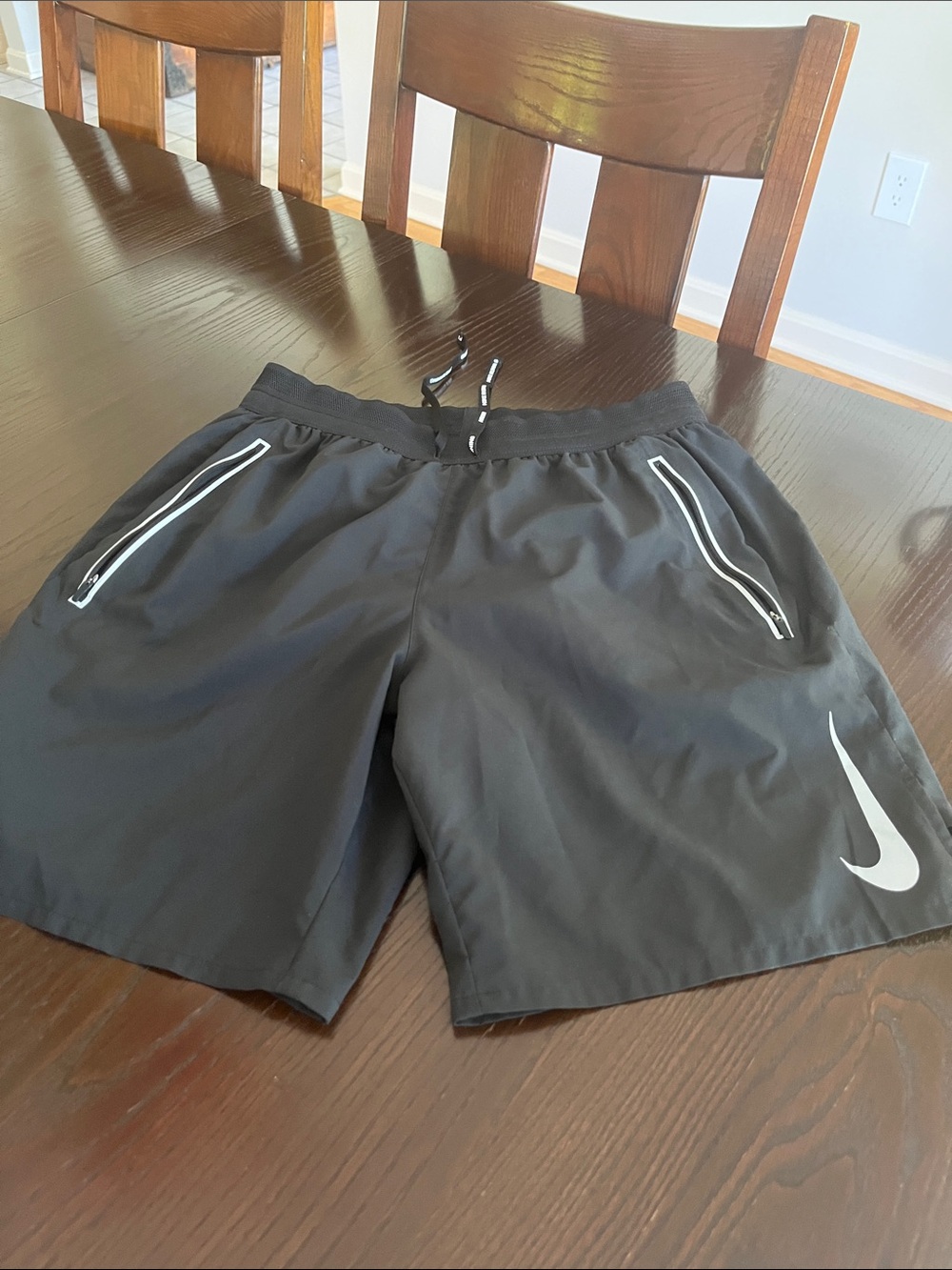 Nike Black Athletic Shorts with White Swoosh